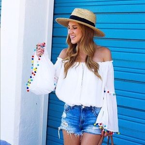 Pom Pom top off the shoulder